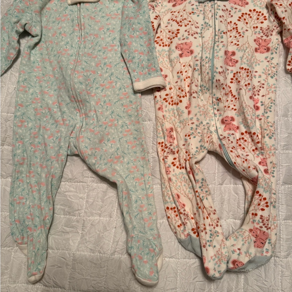 The peanutshell  0-3 months  set of 2 One Pieces Set - Floral and Animal Prints